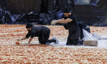 Cooks work inside the Los Angeles Convention Center on January 18