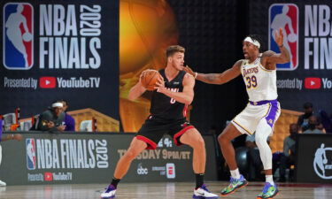 Leonard (left) looks to drive to the basket during the Miami Heat's game against the Los Angeles Lakers during Game Three of the NBA Finals in October of 2020.