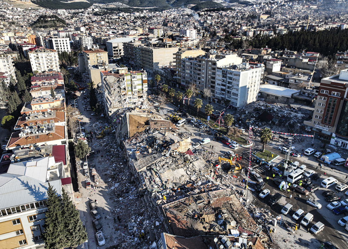 <i>Ahmet Akpolat/DIA/AP</i><br/>An aerial photo shows the destruction in Kahramanmaras