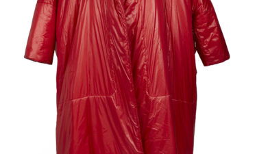 A brick red "Sleeping Bag" clutch coat by Norma Kamali fetched $25