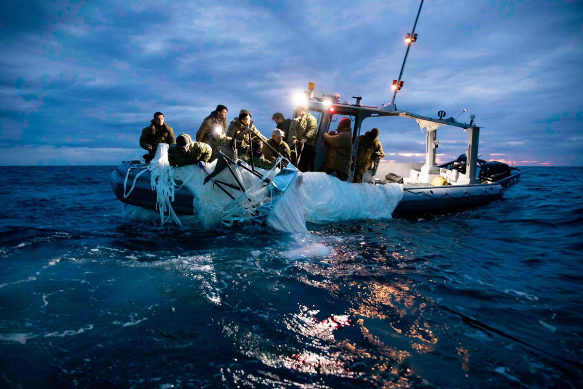 <i>Petty Officer 1st Class Tyler Thompson/US Navy</i><br/>Sailors assigned to Explosive Ordnance Disposal Group 2 recover a high-altitude surveillance balloon off the coast of Myrtle Beach