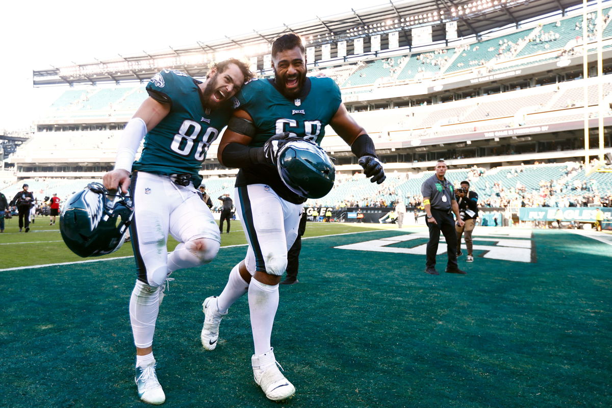 <i>Rich Schultz/AP</i><br/>Philadelphia Eagles tight end Dallas Goedert and Mailata run off the field after defeating the Pittsburgh Steelers.