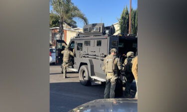 Police at the home of Carlos Medina