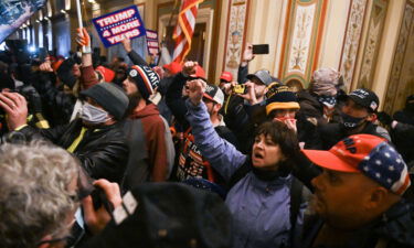 Trump supporters protest inside the US Capitol in Washington