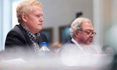 Alex Murdaugh listens to his friend Chris Wilson testify Thursday during his double-murder trial in Walterboro