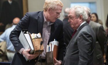 Alex Murdaugh speaks with his attorney Dick Harpootlian during his double murder trial at the Colleton County Courthouse on Wednesday