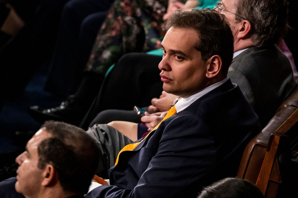 <i>Samuel Corum/Sipa USA/AP</i><br/>The Democrats are launching a new effort to link vulnerable New York Republicans to Rep. George Santos - pictured here at President Joe Biden's State of the Union address on February 7.
