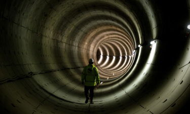 A worker stands in the tunnel of the North-South subway line in Amsterdam in January 2013. Amsterdam's Rokin station contains an underground archaeological museum showcasing subterranean discoveries made during the construction of the city's North-South line.