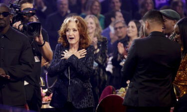 Bonnie Raitt looked stunned when her win for "Just Like That" was announced at the 65th annual Grammy Awards ceremony in Los Angeles on Sunday