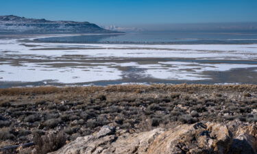 Part of the bed of the Great Salt Lake lies exposed.