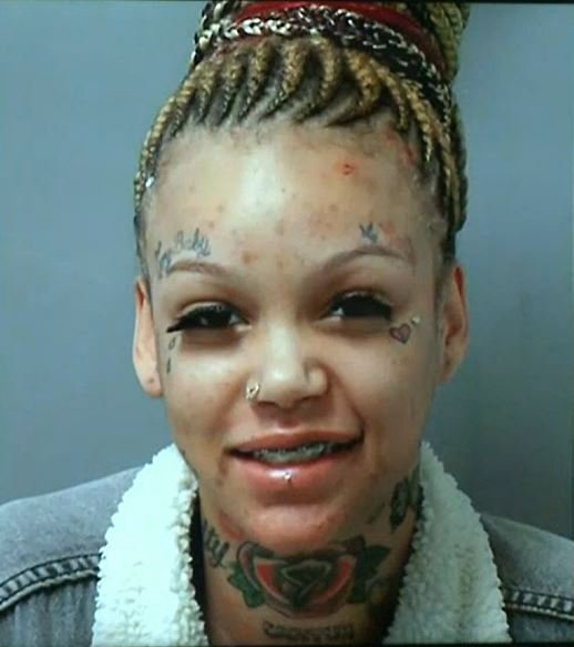 <i>St. Louis Police/KMOV</i><br/>Cierra Wealleans is accused of shooting at teenagers outside a downtown St. Louis high school and violating bond by cutting her ankle monitor.