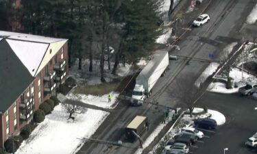 Several utility poles fell onto a Stoneham street after a crash involving a tractor-trailer on Montvale Avenue.