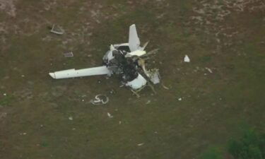 A view from Chopper 5 shows the wreckage from a small plane crash that killed two people at Palm Beach County Park Airport