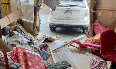 A car crashed into a quilting store in Washington County after police say the driver's shoe slipped off and became stuck between the brake and gas pedal.