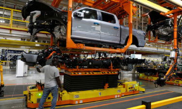 Ford will lose $3 billion on its sales of electric vehicles to consumers this year. Pictured is a Ford production plant in Dearborn