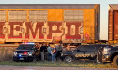 Two migrants died and over a dozen more needed urgent medical attention after being found in train cars in Uvalde