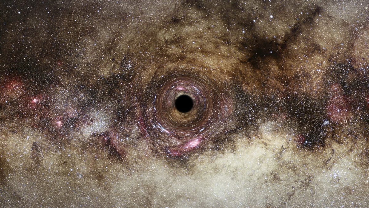 <i>ESA/Hubble/Digitized Sky Survey</i><br/>An artist's impression of a black hole in the Milky Way galaxy.
