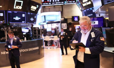 Traders work on the floor of the New York Stock Exchange during morning trading on February 22 in New York City.  Fear overtook Wall Street Thursday after SVB Financial Group told investors it had to sell $1.75 billion in shares at a loss.