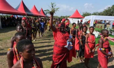 Locals perform traditional rites as Atsu is laid in his tomb in Ada.