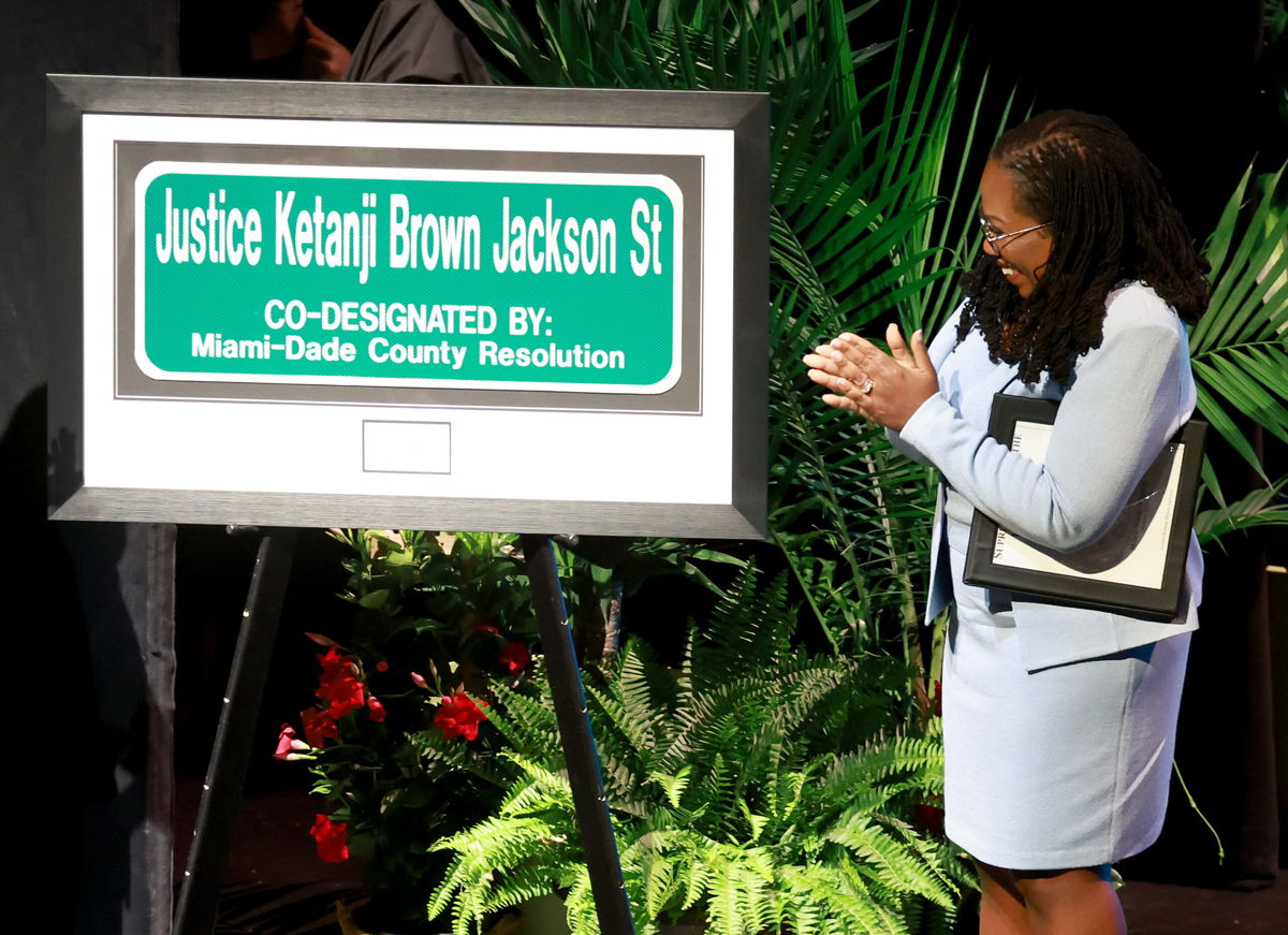 <i>Joe Raedle/Getty Images</i><br/>Justice Ketanji Brown Jackson looks on at a street sign named after her during a street renaming ceremony in Miami-Dade County on March 6 in Cutler Bay
