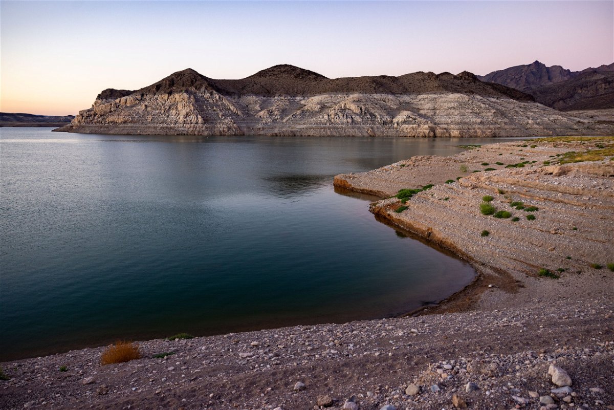 <i>David McNew/Getty Images</i><br/>Land that was once under Lake Mead re-emerged after unprecedented drought pushed the reservoir to very low levels in September 2022.