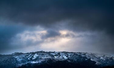Clouds hover above a rare accumulation of snow in the mountains of the Los Padres National Forest in Big Sur