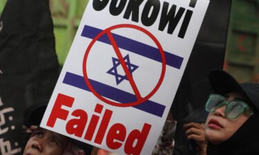 Protesters near the State Palace in Jakarta on March 20 demand the Indonesian government stop the Israeli soccer team from taking part in the FIFA U-20 World Cup.