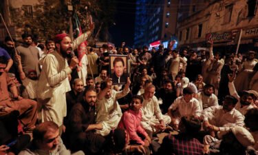 Supporters of former Pakistani Prime Minister Imran Khan chant slogans as they protest