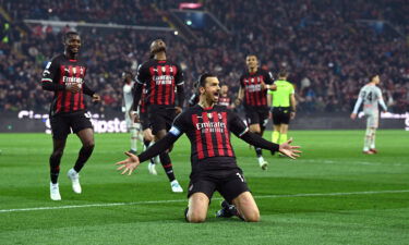 Ibrahimović celebrates with teammates after scoring.