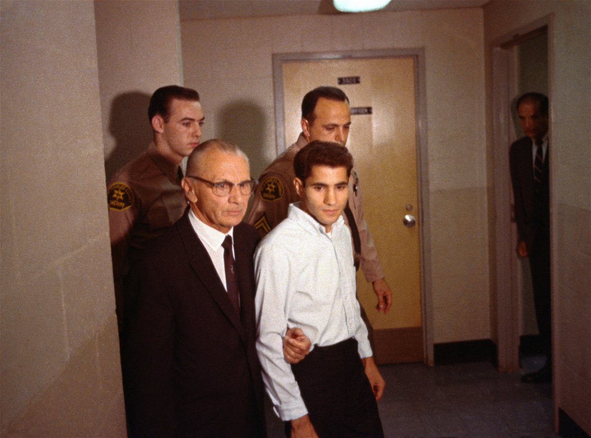 <i>Bettmann Archive/Getty Images</i><br/>Sirhan B. Sirhan (R) and his attorney Russell E. Parsons are photographed as they leave the courtroom on June 28