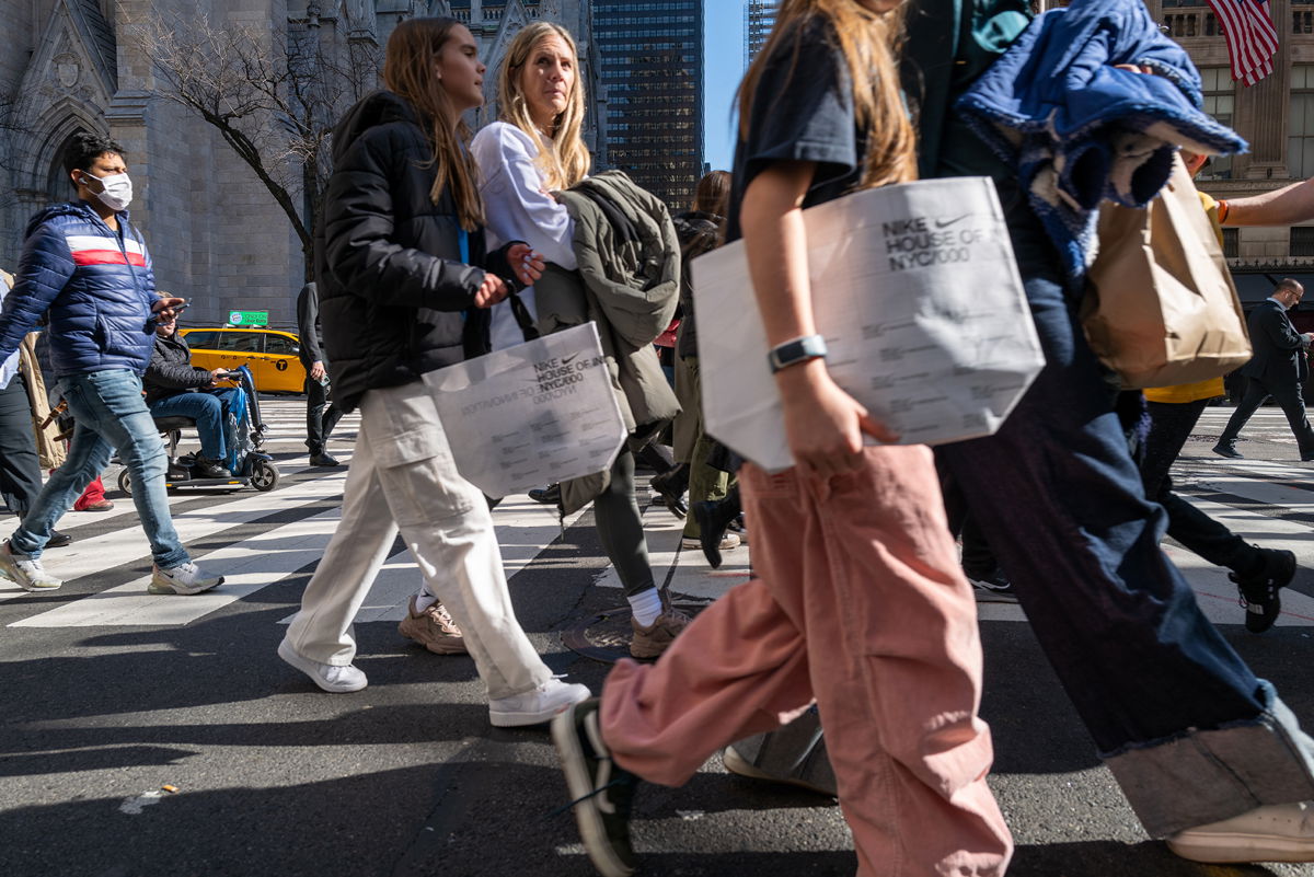 <i>Spencer Platt/Getty Images</i><br/>US consumers kept spending last year despite historically high inflation. Pictured is 5th Avenue in Manhattan