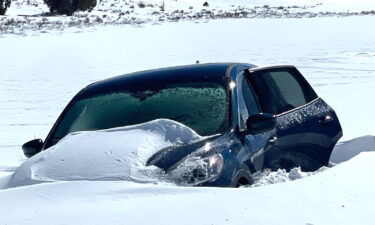 Jerry Jouret's SUV was partially buried in snow when he was found.