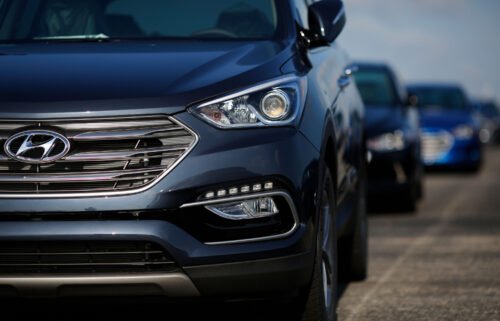 A new Hyundai Motor Co. Santa Fe SUV sits parked before being shipped to a dealership from the Hyundai Motor Manufacturing Alabama facility in Montgomery on July 19