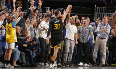 Steph Curry celebrates during the game against the Milwaukee Bucks.