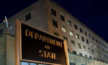 The US State Department imposes a visa sanction on a Syrian military official whom it says killed at least 41 unarmed civilians in April 2013.