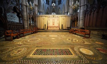 The Cosmati pavement is located in front of the High Altar at Westminster Abbey.