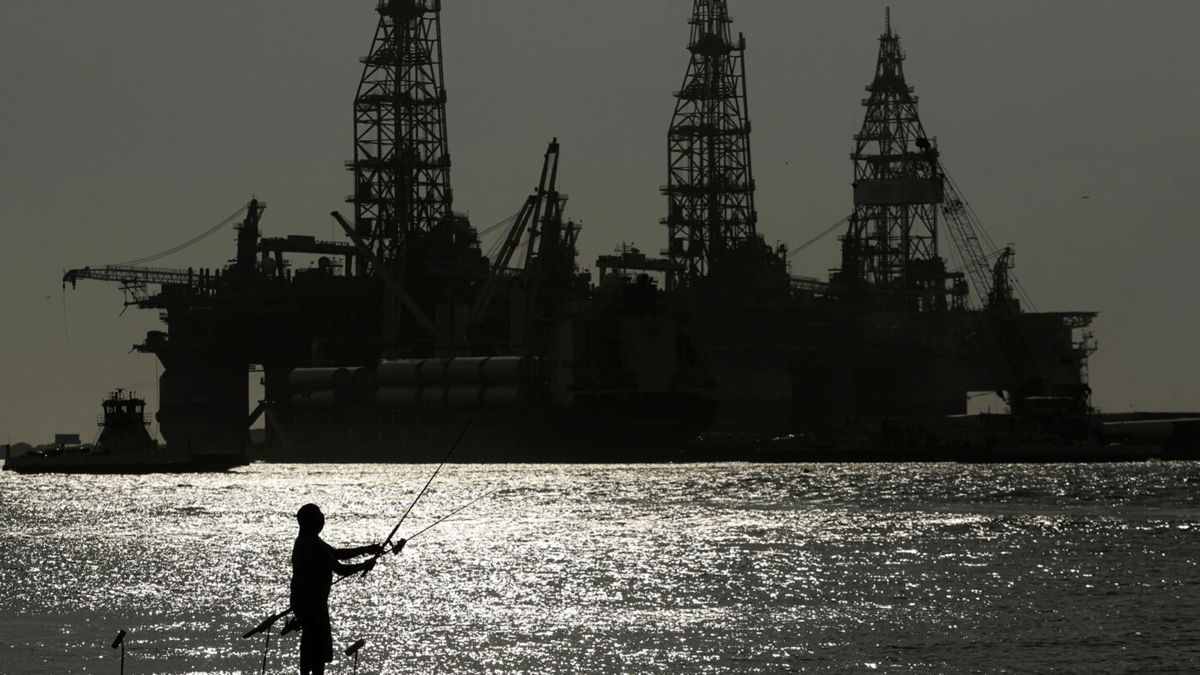 <i>Eric Gay/AP</i><br/>The Biden administration is auctioning off more than 73 million acres of waters in the Gulf of Mexico to offshore oil and gas drilling. Pictured is an oil drilling platform in Port Aransas