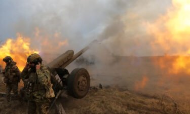 Ukrainian troops fire a D-30 howitzer at Russian positions near Bakhmut