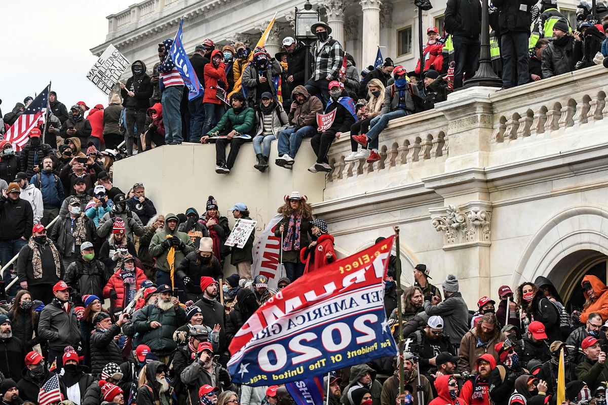 <i>Stephanie Keith/Reuters/File</i><br/>Supporters of then-President Donald Trump gather at the west entrance of the US Capitol on January 6