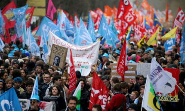 Protesters participate in a demonstration in Reims