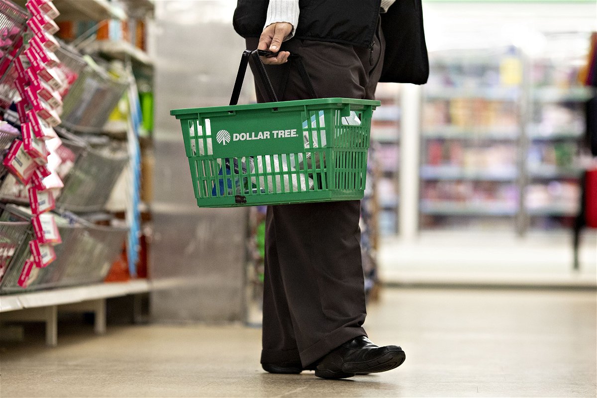 <i>Daniel Acker/Bloomberg/Getty Images</i><br/>A shopper carries a basket inside a Dollar Tree store in Chicago