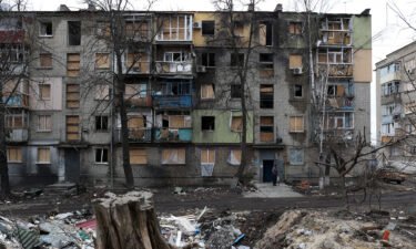 The United States supports the creation of a special tribunal to prosecute to prosecute Russia for 'crime of aggression' in Ukraine. Pictured is a building partially destroyed by Russian shelling in Kupiansk