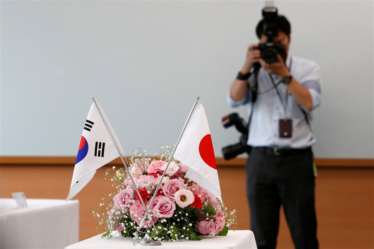 <i>Kim Kyung-Hoon/Reuters</i><br/>South Korea and Japan have on Monday announced a deal to ease strains over wartime labor dispute. The two countries' flags are here displayed in Tokyo