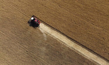 The US announces on Thursday new partnerships to boost Ukraine's agricultural sector and grain production. An aerial image from 2002 shows a farmer harvesting wheat in the Donetsk region in Ukraine.