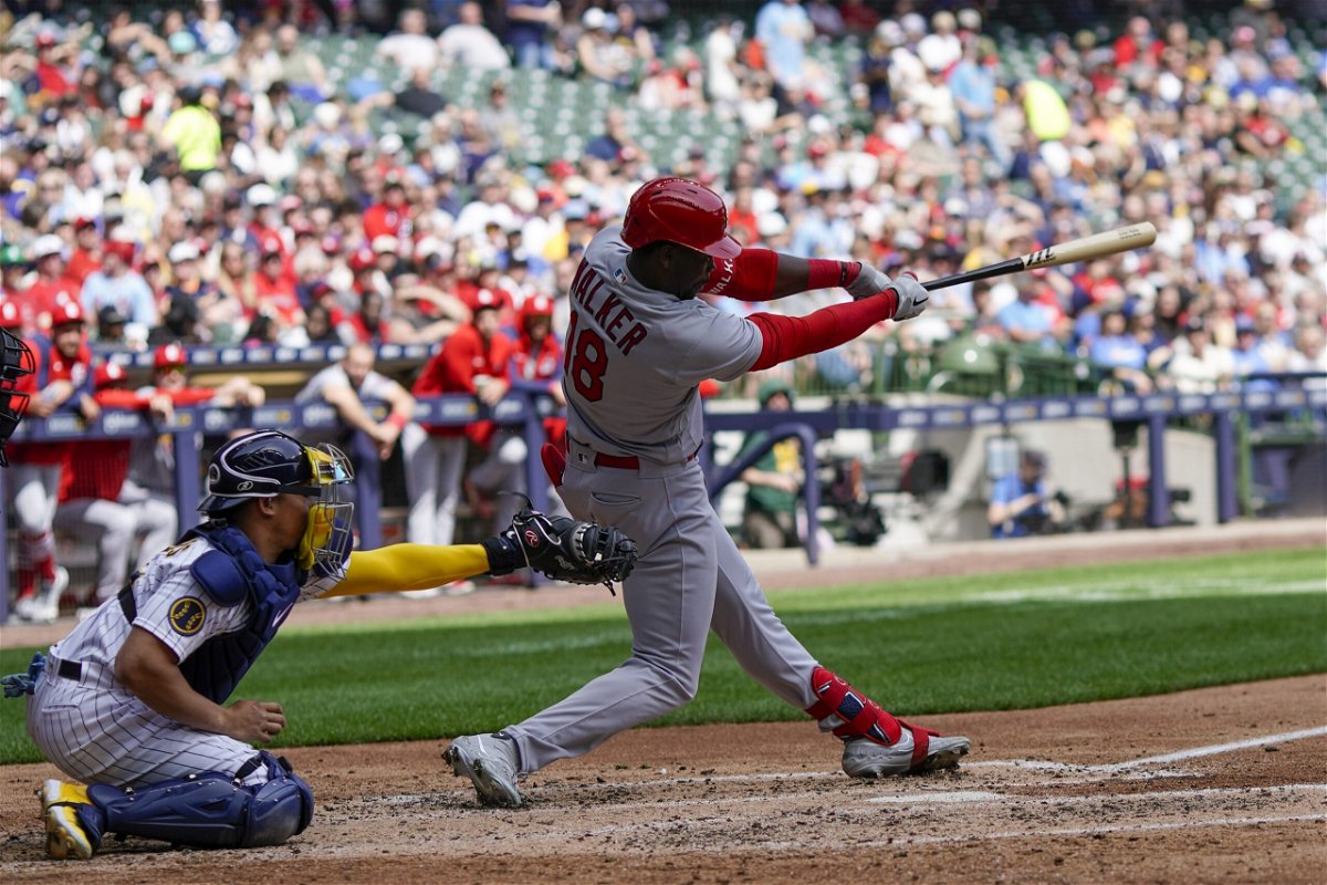 St. Louis Cardinals' Jordan Walker hits an RBI single during the fourth inning of a baseball game against the Milwaukee Brewers Sunday, April 9, 2023, in Milwaukee. (AP Photo/Morry Gash)