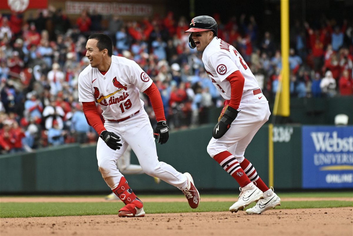 St. Louis Cardinals' Tommy Edman, left, celebrates with Lars Nootbaar, right, after hitting an RBI-single for a walkoff victory over the Pittsburgh Pirates in a baseball game Sunday, April 16, 2023, in St. Louis. 