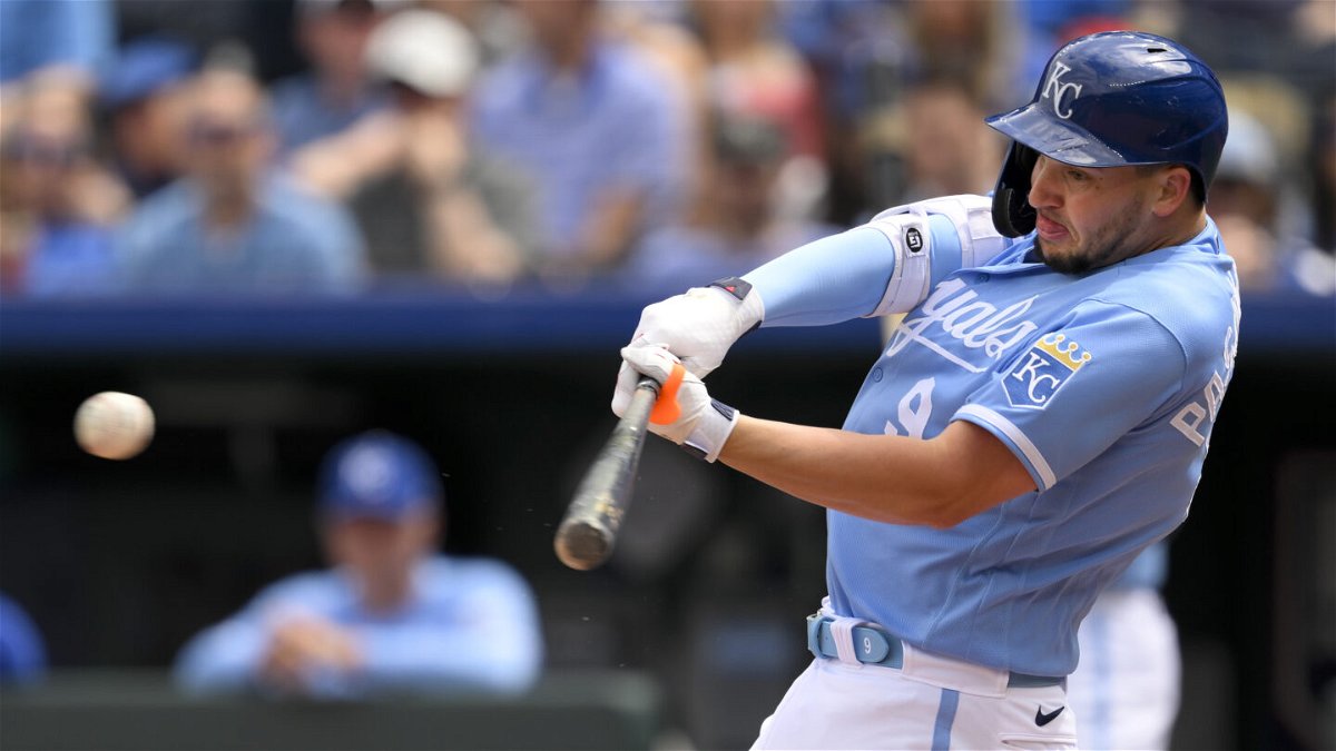 Kansas City Royals' Vinnie Pasquantino (9) hits a single against the Texas Rangers during the sixth inning of a baseball game, Wednesday, April 19, 2023, in Kansas City, Mo. (AP Photo/Reed Hoffmann)