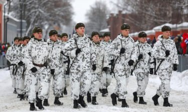 Soliders from the Finnish Armed Forces march during the Independence Day parade in Hamina city in December 2022.