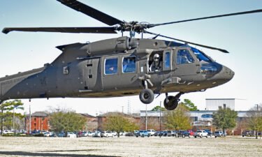 A UH-60 Black Hawk helicopter flies at Fort Rucker