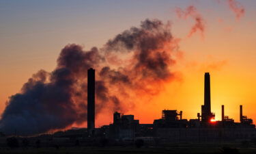 The Dave Johnson coal-fired power plant is silhouetted against the morning sun in Glenrock